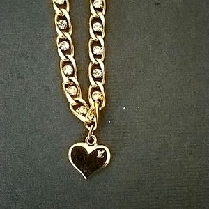 Repurposed LV charm necklace